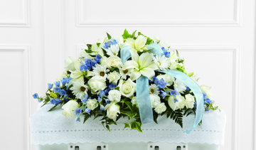 White and Blue Baby Boy Casket Spray